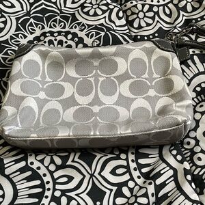 Light Grey/Silver “Signature C” Coach Wristlet